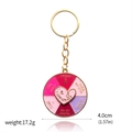 Detail view of a golden confidence spinner keychain with inspiring mental health quotes - Confidence Motivational Keychain