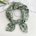 Green floral cotton linen scarf used as a headband or neck scarf on a white background - Tiny Floral Green