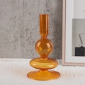 Modern orange tinted borosilicate glass candle holder with stacked spherical design - Orange