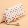 Cream white wristlet clutch with floral Eiffel Tower print and gold zipper hardware - White (Tower Print)