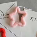 Stella di Natale in peluche rosa con morbida texture in lana di agnello e corda bianca - Rosa
