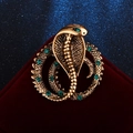 Vintage cobra brooch in gold-plated metal with emerald green rhinestones for women - Antique Gold Coiled Snake