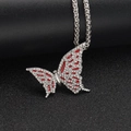 Macro shot of silver hiphop butterfly pendant with red enamel and sparkling rhinestones - Pendant Only / Steel + Red Wings