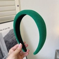 Green padded headband with ribbed texture design for a stylish retro hair accessory - Green Stripe