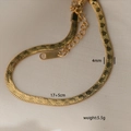 Detail of 4mm gold-plated snake chain anklet showing lobster clasp and extension links - 6-16 (4mm Scale Snake Chain)