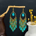 Bohemian turquoise tassel earrings in gold with water drop beads on a wood branch - Exotic Tassel Teardrop Drop (E6234-3)