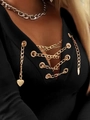 Detail of V-neckline with gold chain and heart pendant on black knit top - S / Tops / Black