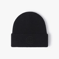 Winter black knit beanie with ribbed texture and minimalist smiley face embroidery - One Size / Black