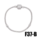 Macro detail of silver snake chain bracelet featuring a sparkling rhinestone cylinder charm - Snake Chain with Pave Zirconia Cylinder Pendant (Style B)