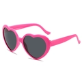Chic pink heart-shaped sunglasses with dark lenses for a trendy summer beach look - Rose Pink