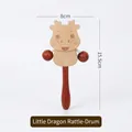 Wooden dragon baby rattle toy with red beads and ergonomic handle, 8cm x 15.5cm size - Little Dragon Pelleted Drum