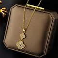 Detail of 18K gold-plated necklace featuring double clover pendants with pavé zircons - Four-Leaf Clover Style (861) / Gold