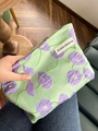 Light green canvas makeup bag with purple flower pattern and A GOGO ORIGINAL tag - Calla Lily Purple
