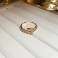 Macro shot of gold plated nail-shaped ring with pavé crystals in white jewelry box - Nail Shape Pavé Set Style (23#)