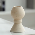 Minimalist beige hourglass ceramic candle holder with natural speckled stone texture - Autumn Hourglass Candlestick / Beige Spotted