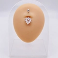Silver leaf navel ring with marquise-cut clear crystals on a silicone display model - Marquise Leaf Shape