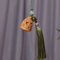 Lignum vitae hollow rabbit pendant with wood beads and a hanging green silk tassel - Lucky Cloud Style (21) / 3.2x2.3cm / Wood Color