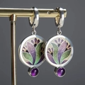 Vintage floral enamel earrings with purple crystal droplets on a display stand - Purple Round