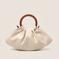 Detailed view of beige pleated evening bag featuring retro round wooden handles - Off White