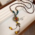 Collar étnico con cuentas de cerámica de colores y colgante de hoja de bronce antiguo - Collar con Colgante de Hoja de Cuentas de Cerámica Multicolor Vintage