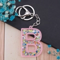 Portachiavi lettera B in acrilico rosa con paillettes colorate e chiusura argento - Lettera B