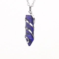 Macro view of natural lapis lazuli hex crystal pendant with silver wire wrap - Silver + Lapis Lazuli