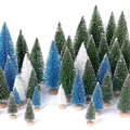 Close-up of mini flocked Christmas trees with snow effect and round wooden bases - Set 14 - Blue/White/Green 30PCS