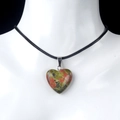 Natural heart-shaped gemstone necklace in red and green stone with black cord - Unakite