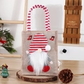 Christmas burlap gift bag featuring a cute red gnome applique and striped handle - Faceless Gnome Stripe Bag