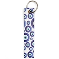 Detailed view of white faux leather keychain with blue evil eye pattern and silver ring - White Blue Pupil Keychain Style (BE1657BU02)