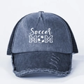 Detail of Soccer MOM print on vintage navy denim trucker hat with distressed brim edges - Navy Blue