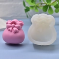 Silikonform für Glücksbeutel zum Backen von Kuchen mit Geldbörsen-Design und Schleifendekor - Glücksbeutel-Form