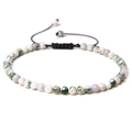 Close-up of 4mm moss agate stone bead bracelet with adjustable black braided cord - Tree Agate