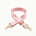 Close-up of adjustable pink zebra pattern shoulder strap with gold metal lobster clasps - Silver Clasp / Pink