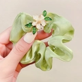 Light green organza scrunchie with white flower pendant and golden leaf detail - FQ1004A Green