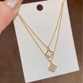 Double-layered golden necklace featuring open and zircon-studded lucky clover pendants - Gold Zirconia Double Layer Clover Pendant Necklace