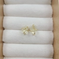 Elegant four-prong stud earrings with translucent pale yellow stones in gold setting - Citrine