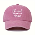 Close-up of white 'Blessed Nana' embroidery on a washed pink vintage cotton baseball cap - Pink