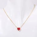 Golden stainless steel necklace featuring a vibrant red heart-shaped birthstone pendant - July