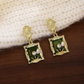 Macro detail of French vintage gold earrings with green enamel and pearl accents - Dark Green Oil Painting Pearl Drop (E6464)