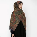 Close-up of thick core-spun yarn shawl with paisley pattern and tassel fringes - Dark Green Red (T490-06)