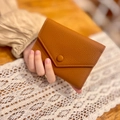 Slim brown lychee grain genuine leather envelope wallet for women with snap closure - Brown