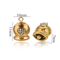 Macro shot of 10mm gold stainless steel bell charm with heart-shaped diamond inlay detail - Heart-Gold