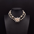 Elegant double-layer freshwater pearl necklace with a baroque flower petal pendant - Baroque Pearl Flower Necklace