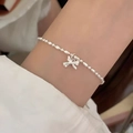 Silver beaded bracelet with butterfly pendant worn on wrist for minimalist luxury style - Silver Butterfly Pendant Beaded (MY36873)