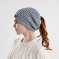 Women's grey cable knit ponytail beanie with ear protection and faux leather patch label - Gray
