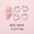 Close-up of heart hollow nail charms with AB rhinestones on a manicured nail and pink base - Silver Large Heart Pave AB Rhinestone Charm (9928)