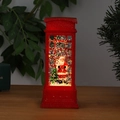 Detail der leuchtenden roten Weihnachts-Telefonzelle mit Weihnachtsmann und Glitzereffekt - Telefonzelle Weihnachtsmann (Wasserinjektion)