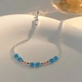 Silver bracelet featuring light blue rectangular elements and brown zircon accents - Double Row Turquoise/Blue