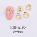 Detail of 8x9mm golden hollow heart nail charm with amber orange gem and tiny white diamonds - Gold Base Amber Orange Zirconia (A190)